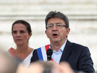 Jean-Luc Melenchon speaks as supporters of political party LFI take to the streets of Paris, France on July 12, 2017 to protest the recently...