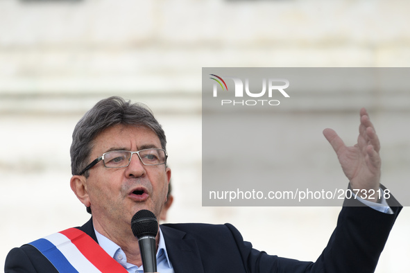 Jean-Luc Melenchon speaks as supporters of political party LFI take to the streets of Paris, France on July 12, 2017 to protest the recently...