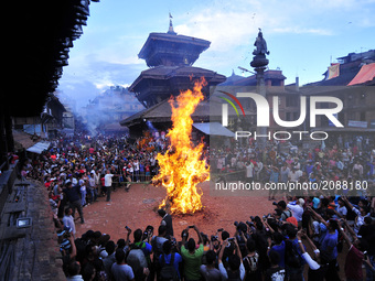 Nepalese devotees celebrate by burning effigy of demon Ghantakarna during the Ghantakarna or Gathemangal festival celebrated at Bhaktapur, N...