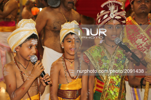 Tamil Hindu boys in training to become Hindu priests recite prayers during the Nambiyaandaar Nambi Ustavam Thiruvizha pooja at a Hindu Templ...