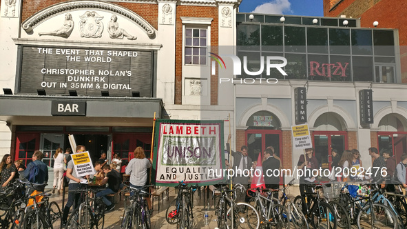 Union leaders from Unison protest outside of Ritzy Cinema for better pay in Brixton London United Kingdom on July 21st 2017.  