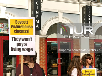 Union leaders from Unison protest outside of Ritzy Cinema for better pay in Brixton London United Kingdom on July 21st 2017.  (