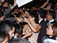 Actress Aislinn Derbez is seen take a selfie with the fans during the pink carpet to promote the latest film 'Hazlo Como Hombre' at Cinepoli...