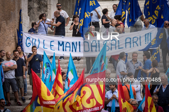 Atac workers protest during the municipal council on the Atac crisis,in Rome, Italy on 07 September 2017. 