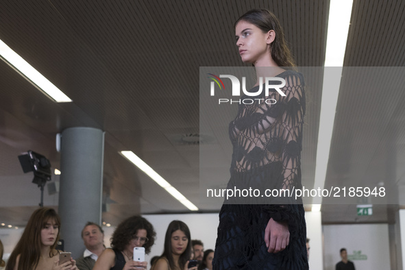 A model presents Maria Cle Leal  Spring/Summer 2018 collection Mercedes-Benz Fashion Week Madrid in Madrid, Spain, 14 September 2017.  