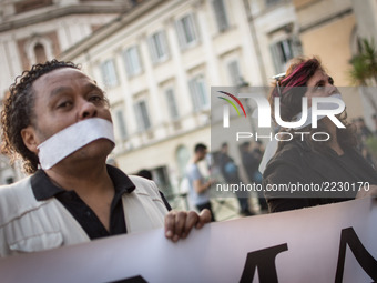 The workers of the usb union gagged against during the demonstration of the Basic Trade Union (USB) in solidarity with the workers of Corpa...