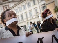 The workers of the usb union gagged against during the demonstration of the Basic Trade Union (USB) in solidarity with the workers of Corpa...