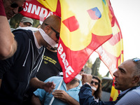 Demonstration of the Basic Trade Union (USB) in solidarity with the workers of Corpa srl, who occupied the scaffolding in Piazza Madonna di...