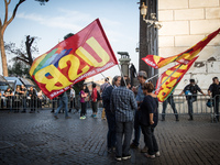 Demonstration of the Basic Trade Union (USB) in solidarity with the workers of Corpa srl, who occupied the scaffolding in Piazza Madonna di...