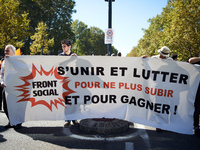 A banner reads 'Uniting and fighting for winning and no more suffer'. More than 15000 protesters took to the streets of Toulouse against the...