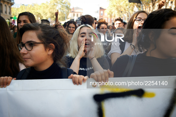 A student shout slogans. More than 15000 protesters took to the streets of Toulouse against the new Macron's reforms on the Work Code. It's...