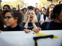 A student shout slogans. More than 15000 protesters took to the streets of Toulouse against the new Macron's reforms on the Work Code. It's...