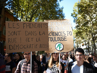 Banners read 'Lazys are in the street, also democracy'. More than 15000 protesters took to the streets of Toulouse against the new Macron's...