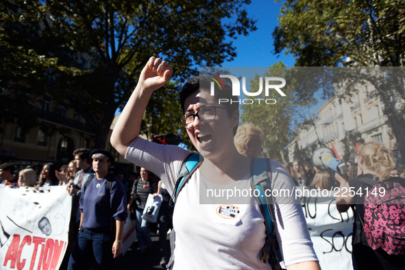 A student shout slogans. More than 15000 protesters took to the streets of Toulouse against the new Macron's reforms on the Work Code. It's...