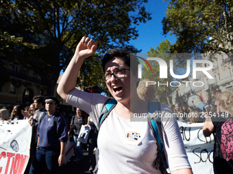 A student shout slogans. More than 15000 protesters took to the streets of Toulouse against the new Macron's reforms on the Work Code. It's...