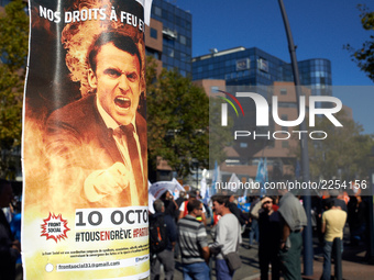 A poster depicting French President Emmanuel Macon. More than 15000 protesters took to the streets of Toulouse against the new Macron's refo...