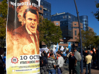 A poster depicting French President Emmanuel Macon. More than 15000 protesters took to the streets of Toulouse against the new Macron's refo...