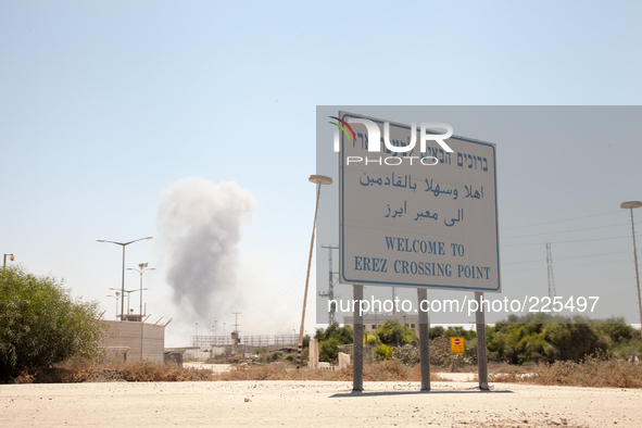 The clashes between Israeli forces and Hamas fighters were visible from the welcoming sign at the border crossing. 