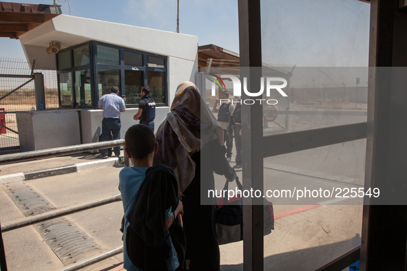 Palestinian refugees on their way back into the Gaza Strip, some of the very few that decided to come back during the still ongoing Operatio...