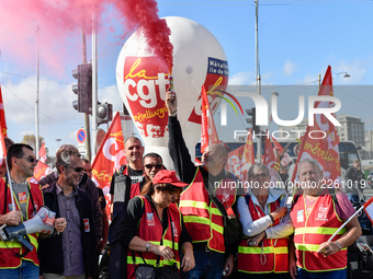 Metalworkers demonstrate as they march with banners and flags in the streets of Paris on October 13, 2017. Several thousand workers have tak...