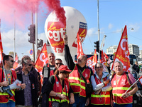 Metalworkers demonstrate as they march with banners and flags in the streets of Paris on October 13, 2017. Several thousand workers have tak...