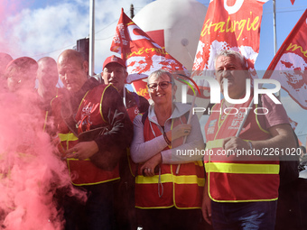 Metalworkers demonstrate as they march with banners and flags in the streets of Paris on October 13, 2017. Several thousand workers have tak...