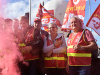 Metalworkers demonstrate as they march with banners and flags in the streets of Paris on October 13, 2017. Several thousand workers have tak...