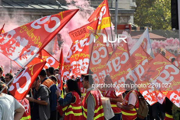 Metalworkers demonstrate as they march with banners and flags in the streets of Paris on October 13, 2017. Several thousand workers have tak...