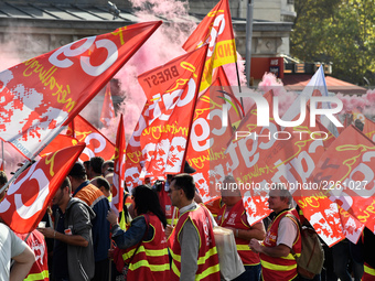 Metalworkers demonstrate as they march with banners and flags in the streets of Paris on October 13, 2017. Several thousand workers have tak...