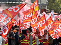 Metalworkers demonstrate as they march with banners and flags in the streets of Paris on October 13, 2017. Several thousand workers have tak...