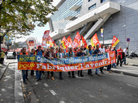 Metalworkers demonstrate as they march with banners and flags in the streets of Paris on October 13, 2017. Several thousand workers have tak...