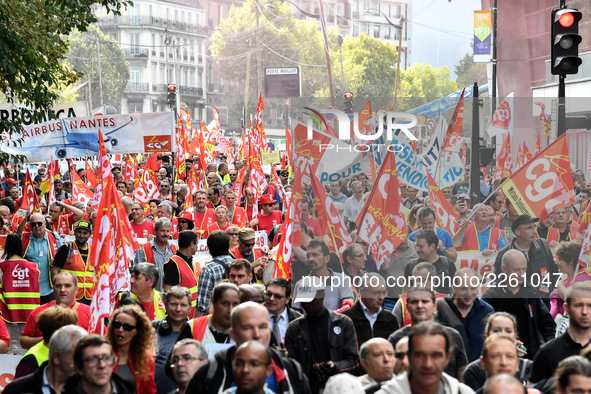 Metalworkers demonstrate as they march with banners and flags in the streets of Paris on October 13, 2017. Several thousand workers have tak...