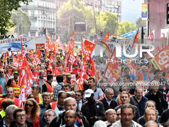 Metalworkers demonstrate as they march with banners and flags in the streets of Paris on October 13, 2017. Several thousand workers have tak...