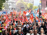 Metalworkers demonstrate as they march with banners and flags in the streets of Paris on October 13, 2017. Several thousand workers have tak...