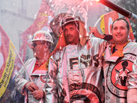 Metalworkers demonstrate as they march with banners and flags in the streets of Paris on October 13, 2017. Several thousand workers have tak...