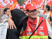 Metalworkers demonstrate as they march with banners and flags in the streets of Paris on October 13, 2017. Several thousand workers have tak...