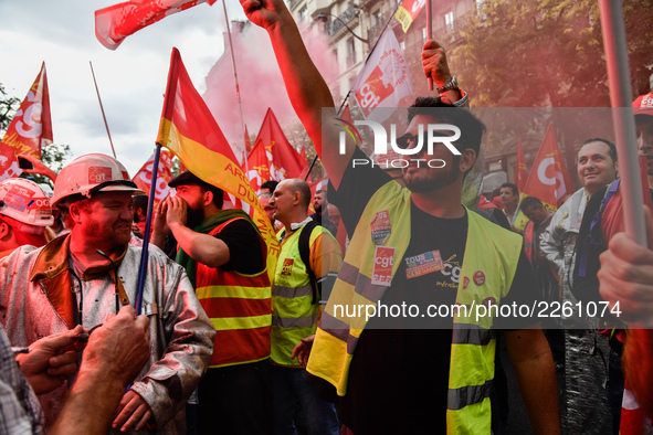 Metalworkers demonstrate as they march with banners and flags in the streets of Paris on October 13, 2017. Several thousand workers have tak...