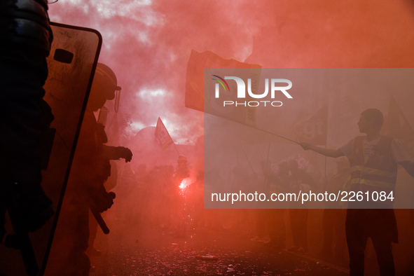 Metalworkers demonstrate as they march with banners and flags in the streets of Paris on October 13, 2017. Several thousand workers have tak...