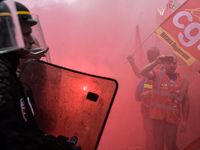 Metalworkers demonstrate as they march with banners and flags in the streets of Paris on October 13, 2017. Several thousand workers have tak...