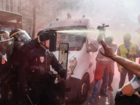 Metalworkers clashes with anti-riot police in the streets of Paris on October 13, 2017. Several thousand workers have taken part in a protes...