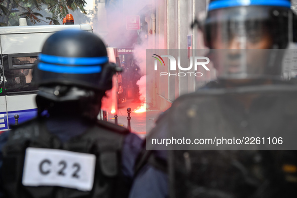 Metalworkers demonstrate as they march with banners and flags in the streets of Paris on October 13, 2017. Several thousand workers have tak...