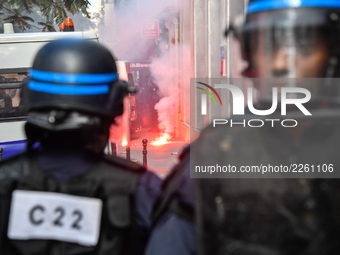 Metalworkers demonstrate as they march with banners and flags in the streets of Paris on October 13, 2017. Several thousand workers have tak...