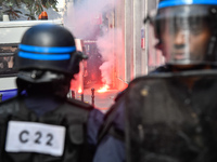 Metalworkers demonstrate as they march with banners and flags in the streets of Paris on October 13, 2017. Several thousand workers have tak...