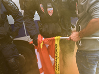 Metalworkers clashes with anti-riot police in the streets of Paris on October 13, 2017. Several thousand workers have taken part in a protes...