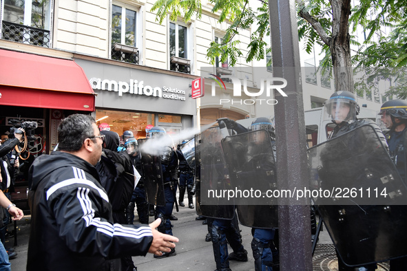 Metallurgy workers clashes with anti-riot police in the streets of Paris on October 13, 2017. Several thousand workers have taken part in a...