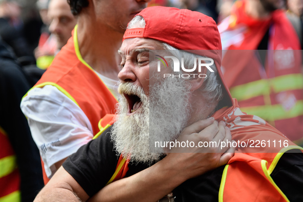 Metalworkers demonstrate as they march with banners and flags in the streets of Paris on October 13, 2017. Several thousand workers have tak...