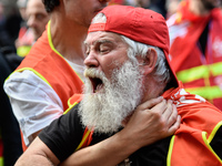 Metalworkers demonstrate as they march with banners and flags in the streets of Paris on October 13, 2017. Several thousand workers have tak...