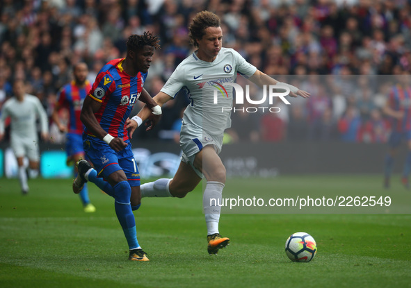 Crystal Palace's Wilfried Zaha takes on Chelsea's David Luiz
during Premier League  match between Crystal Palace and Chelsea at Selhurst Pa...