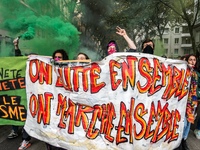 People march behind a banner as thousands gather in the streets of Lyon, France to protest against the labor law at the call of the CGT, the...