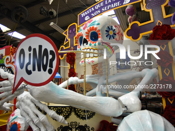 Workers of the 'Taller el Volador' made  the manufacture of skulls and catrinas that will be used for the Day of the Dead Parade inspired by...